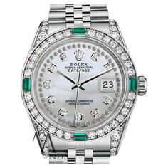 Rolex 31mm Datejust White MOP String Diamond Dial with Diamond & Emerald Bezel & Diamond Lugs SS Watch 68274 Luxury Silver Watch With Diamond Hour Markers, Luxury Designer Diamond Watch With Chronometer, Luxury Green Diamond Watch With Diamond Hour Markers, Luxury Rhinestone Watch With Round Dial, Luxury Silver Watch With Pave Setting, Luxury Chronograph Watch With Diamond Markers, Luxury Formal Watch With Diamond Accents, Luxury Business Chronograph Watch With Diamond Markers, Luxury Classic Diamond Watch As Gift