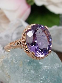 Natural Amethyst Ring, 3.3ct Natural oval Amethyst, Rose Gold over Sterling Silver floral Filigree, Edward design #D70z, top view on finger Classic Amethyst Rose Gold Jewelry, Classic Rose Gold Amethyst Jewelry, Elegant Oval Amethyst Ring In Rose Gold, Elegant Oval Rose Gold Amethyst Ring, Elegant Rose Gold Oval Amethyst Ring, Formal Rose Gold Amethyst Ring, Elegant Amethyst Diamond-cut Ring, Classic Rose Gold Amethyst Rings, Formal Rose Gold Amethyst Ring With Center Stone