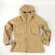 "Vintage Hunting Parka Two-way zipper with storm flap closure, 4 flap pockets, 2 elastic shotgun shells holders, velcro-adjustable cuffs, hood Mens label: L (FITS MEN'S L TO XL) Please check the measurements Measurements approx.: pit to pit across front 26\", length from collar seam to the end of sleeve 33\", jackets length approx 32\" Condition: great condition Mfg.: Gamehide C 1970's-80's" Tactical Outdoor Outerwear With Pockets, Combat Style Outerwear With Pockets For Outdoor Activities, Combat Style Outerwear With Pockets For Outdoor, Functional Hunting Outerwear With Pockets, Functional Fall Hunting Windbreaker, Functional Fall Windbreaker For Hunting, Military Style Waterproof Parka For Outdoor, Military Style Outerwear With Multiple Pockets For Outdoor Activities, Military Style Outerwear With Multiple Pockets For Outdoor