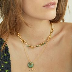 Featuring vibrant gemstones and an 18k gold-filled toggle, the Gemstone Toggle Necklace is a fusion of color and contemporary design. It's perfect for adding a bold yet elegant touch to any ensemble. Green Pendant Necklace, Gold Lariat Necklace, Green Pendants, Necklace Stone, Toggle Necklace, Travel Jewelry Case, Ethical Jewelry, Green Necklace, Gold Chain Necklace