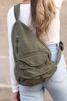 100% Cotton Canvas Measurement: 13"x 4.5"x 16 Adjustable Strap from 10"-33" Side Zip Closure Front Velcro Pocket Front Zip Pocket Interior Small Zip Pocket Canvas Sling Bag, Mode Shoes, Sling Pack, Hat Hairstyles, Sling Bag, Canvas Bag, Handbag Accessories, Side Zip, Apparel Accessories