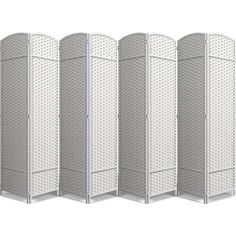 four white room dividers with perfored panels on each side and one in the middle