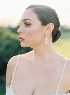 The delicacy and sparkle of our 'Isabella' bridal earrings are absolutely swoon worthy! | wedding hair, bridal hair styles, bridal hair accessories, bridal gifts inspo, accessories for brides, bridal earrings , bridal crown, gift ideas for her, jewelry for brides, luxury jewelry, diamond crown, diamond earrings, drop earrings, sparkly earrings, earrings for brides, bridal gift ideas, diamond tiara, bridal updo, glamorous wedding, women's jewelry and accessories #bridaltiara #bridetobe #wedding Bridal Chandelier Earrings, Isabella Rose, Diamond Chandelier Earrings, Diamond Chandelier, Bridal Earrings Chandelier, Diamond Accessories, Beautiful Tiaras, Diamond Tiara, Rose Gold Bridal