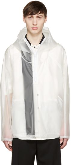 Long sleeve hooded rain coat in translucent vinyl.  Zip closure at front. Adjustable bungee drawstring at sleeve cuffs and hem with black stoppers. Tonal stitching. Majid Jordan, White Cloth, Hooded Raincoat, Raincoats For Women, Rain Coat, Chef's Jackets, Rain Jacket, Jordan, Michael Kors