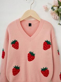 Add a dash of playful appeal to your casual wear with our Plus Size Strawberry Pattern Pullover Sweater. This sweater features a fresh fruit and vegetable pattern, with vibrant strawberry embroidery that pops against the soft pink backdrop. The V-neck design flatters the neckline, while the long sleeves and drop-shoulder cut offer a comfortable, relaxed fit. Designed with a loose outline, this pullover ensures a breezy feel with plenty of room to move. The knitwear fabric provides a slight stret Strawberry Embroidery, Comfy Jumpsuits, Strawberry Pattern, Pink Backdrop, Shoulder Cut, Cozy Sweaters, Fresh Fruit, Neck Designs, Pullover Sweater