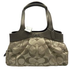 Coach Signature Lexi Shoulder Bag Features: • Khaki/Copper. Double copper brown leather handles. Roomy zipper center compartment. 2 snap closure sections. 4 inside open pockets & 1 zip inside pocket. Satin fabric lining. Size: Womens Large Measurements: Height 9 in / 23 cm Width 15.5 in / 39 cm Depth 4.5 in / 11 cm Handle Drop 9 in / 23 cm Condition: New With Tags Smoke free home. Offers Welcome! P8 Vintage Coach Bags, Copper Brown, Brown Leather Shoulder Bag, Brown Shoulder Bag, Coach Shoulder Bag, Black Leather Handbags, Large Shoulder Bags, Black Shoulder Bag, Canvas Shoulder Bag