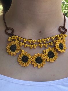 Handmade Bohemian Sunflower Necklace, Turkish Needle Lace Jewelry, Mom Gifts, Traditional Oya ❤️ Beaded Sunflower Necklace is special for women. You can wear this handmade necklace every day. The sunflower necklace will definitely add a stylish finishing touch to your look. You can choose this handmade necklace as a birthday gift or anniversary gift for your mother, wife or girlfriend. If they like beaded jewelry and needlework, this unique handmade necklace is a perfect choice for them. 🎁 Uniq Bohemian Flower Necklace For Summer, Bohemian Jewelry With Flower Decoration For Summer, Bohemian Summer Jewelry With Flower Decoration, Handmade Flower Necklace For Summer, Handmade Summer Flower Necklace, Bohemian Flower Beaded Necklaces For Summer, Bohemian Brown Flower Necklace, Yellow Flower-shaped Beaded Necklaces, Yellow Flower-shaped Beaded Necklace