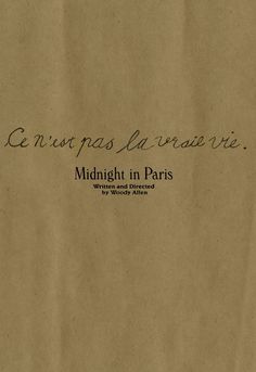 a piece of brown paper with writing on it that says, midnight in paris the world's most famous place