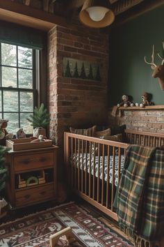 a baby crib in the corner of a room with a deer head on the wall