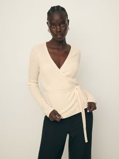 Layer up. Shop the Blaire Ribbed Wrap Cardigan from Reformation, a long-sleeve wrap cardigan with an adjustable tie. Wrap Cardigan Outfit, Chic Long Sleeve Fitted Wrap Top, Elegant Knit Wrap Cardigan, Wrap Sweater Outfit, Fitted Knit Wrap Cardigan, Soft Knit Wrap Cardigan, Ballet Wrap Cardigan, Wrap Top Outfit, Cardigan Outfit Aesthetic