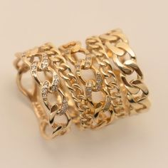 For fingers that don't shy away from a statement. Our bold chain ring is handcrafted in 14k solid gold, making it the perfect everyday statement piece. Stackable Yellow Gold Chain Ring For Promise, 14k Gold Oval Link Rings, Fine Jewelry, Yellow Gold Open Ring With Chain Detail, Yellow Gold Open Ring With Chain, Yellow Gold Chain Link Ring With Curb Chain Detail, 14k Gold Chain Ring Tarnish Resistant, Luxury Chain Rings, 14k Yellow Gold Chain Link Ring, 14k Yellow Gold Link Chain Ring