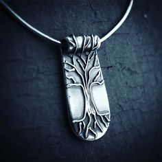 This tree of life has intricate raised roots and branches, supporting our connection to the earth, our ancestors, and our inner wisdom. Piece is fine silver (999), approximately 1.25” long, and hangs on a sterling silver chain. Free shipping on all orders within the USA! International orders flat rate of $8. It takes me approximately 10 days to create and ship your piece, as I hand-make each one. Symbolic Silver Tree Of Life Jewelry, Symbolic Silver Jewelry With Tree Of Life, Bohemian Silver Jewelry With Tree Of Life, Unique Tree Of Life Pendant Necklace, Symbolic Tree Of Life Sterling Silver Jewelry, Symbolic Sterling Silver Tree Of Life Jewelry, Spiritual Sterling Silver Jewelry With Tree Of Life, Sterling Silver Tree Of Life Nature-inspired Jewelry, Spiritual Tree Of Life Sterling Silver Necklace