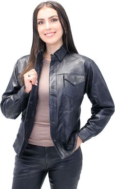 Leather shirt for women also available in plus sizes. A black leather women's shirt that is great looking, tailor fitting, lightweight and ideal for riding. This women's leather shirt is exclusive Jamin Leather® and modeled after a classic jean style shirt. Made of soft buffalo leather that snaps up front, has two snap down chest pockets, two inside chest pockets, two hidden front pockets in the seams, snap cuffs, snap down collar to keep from flapping and has a soft nylon lining. This leather shirt for women is a bit longer and helps keep the draft out while riding. Made with extra durable long lasting buffalo leather. Sizes may run small. Sizes: XS, S, M, L, XL, 2X, 3X, 4X, 5X. +$10 for 2X-3X, +$20 for 4X-5X. [3#] soft nylon lining two hidden front pockets two inside chest pockets two ch Button-up Leather Jacket, Black Leather Button-up Top, Fitted Classic Leather Tops, Classic Fitted Leather Tops, Fitted Classic Leather Top, Classic Leather Tops For Fall, Ladies Shirt, Leather Travel Bag, Leather Skin