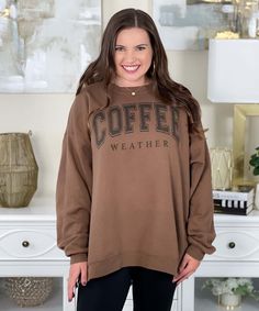 Introducing our Coffee Weather Sweatshirt, the perfect cozy companion for embracing those crisp and chilly days. Whether you're heading to your favorite coffee shop, enjoying a leisurely stroll in the park, or simply lounging at home with a warm cup of java, this sweatshirt celebrates your love for both comfort and caffeine.
The words "coffee weather" are elegantly displayed in black on an army brown sweatshirt. Available in sizes ranging from S to 5XL, our sweatshirt ensures a comfortable and relaxed fit for everyone.
Embrace the essence of fall and winter with the inviting warmth of your go-to coffee and the cozy comfort of our sweatshirt. The soft fabric and casual silhouette make it an ideal addition to your casual wardrobe, while the stylish design adds a touch of flair to your everyd Substitute Teacher Outfits, Brown Sweatshirt, Cozy Lounge, Black Friday Christmas, Changing Seasons, Comforters Cozy, Lounge Pants, Casual Wardrobe, Favorite Jeans