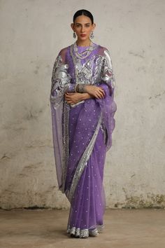 Immerse yourself in the essence of modern India and traditional Indian crafts with this exquisite sari. Crafted from luxurious silk organza, it is adorned with intricate hand embroidery using the applique and aari techniques in metallic silver. This blend of traditional craftsmanship and contemporary design makes it a true masterpiece, perfect for making a statement at any special occasion. Organza Sari, Modern India, Indian Crafts, Silk Organza, Traditional Indian, Cosmos, Hand Embroidery, Contemporary Design, Metallic Silver