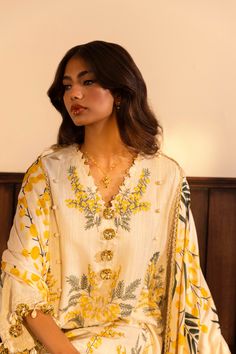 Brand: Sana SafinazProduct Code: M243-007B-3CPCollection: Muzlin by Sana Safinaz Unstitched Winter CollectionFabric: Slub DESIGN DETAILS: Embroidered Front Kali On Slub 3 Pieces Dyed Back On Slub 1.20 Meters Embroidered Sleeves On Slub 0.65 Meters Embroidered Kuful For Sleeves On Organza. 2 Pieces Digital Printed Shawl 2.5 Meters Dyed Cotton Pants 1.75 Meters DISCLAIMER:* Lining, Laces, and Tassels are not included in unstitched variants.* Embellishment items in stitched outfits are subject to market availability.* Product color may vary due to photographic lighting or your device settings. CARE INSTRUCTIONS: Extra Fabric Has Been Used For Shoot Original Color May Vary Slightly From The Picture Dry Clean Recommended Iron The Clothes At Moderate Temperature Do Not Use Bleach, Or Stain Remov Designer Embroidered V-neck Kurta, Designer V-neck Embroidered Kurta, Designer V-neck Sets For Eid, Unstitched V-neck Kurta For Eid, Eid Palazzo Set With Dabka Work And V-neck, Festive Embroidered V-neck Palazzo Set, Embroidered Chanderi V-neck Sets, Designer Embroidered V-neck Set, Embroidered V-neck Set For Designer Wear