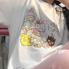 Celebrate Friendship with Our Kawaii Sanrio Friends T-Shirt! 👬👭 🌟 Adorable and Playful: This t-shirt is perfect for adding a touch of cuteness to your everyday outfits. Ideal for showing off your love for the Sanrio characters and celebrating friendship. ✨ Superior Quality: Crafted with precision to ensure top-notch quality. Designed with a comfortable fit and featuring a colorful Sanrio Friends design. 💫 Sanrio Charm: Enjoy the delightful presence of your favorite Sanrio characters on your Sanrio Outfits, Hello Kitty Print, Cartoon Friends, Kawaii Summer, Hello Kitty T Shirt, Cartoon Hello Kitty, Celebrating Friendship, Friends Design, Kawaii Shirts