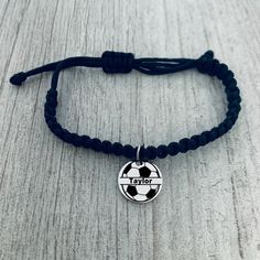 UNISEX SOCCER BRACELET -Braided Cords Weaved together with Stainless Steel Engraved Soccer Ball Charm with your choice of text ADJUSTABLE - soccer bracelet is adjustable. Easily Adjusts to Fit your Wrist 5" to 8" *will fit most wrists sizes small to large SOCCER GIFT - Looking for a custom soccer gift ? Got a birthday, holiday, or other special occasion coming up for the soccer player in your life? This sports bracelet makes a great gift, whether for a friend, daughter, son or teammate. DESIGNED Adjustable Fit Engraved Bracelets For Personalized Gifts, Adjustable Engraved Bracelets For Personalized Gifts, Personalized Adjustable Engraved Bracelets, Customizable Adjustable Silver Wristband, Customized Adjustable Silver Charm Bracelet, Customized Adjustable Silver Wristband, Adjustable Silver Charm Bracelet With Engraving Option, Adjustable Silver Name Bracelet With Engraving Option, Adjustable Engraved Braided Bracelet For Friendship