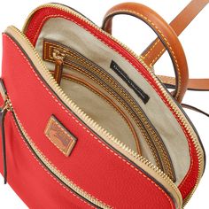 Carry Comfortably    This versatile backpack, made from pebble leather with a natural grain that hides signs of daily wear, keeps your hands free for on-the-go days. Red Leather Backpack With Zipper For Everyday, Red Backpack With Zipper Pocket For Everyday Use, Red Leather Backpack With Zipper Closure, Red Backpack With Zipper Pocket For Daily Use, Everyday Purse Dooney & Bourke, Dooney And Bourke Disney, Satchel Handbags Dooney & Bourke, Dooney & Bourke Bag, Satchel Tote