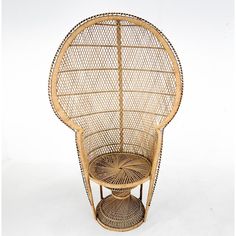 a wicker chair sitting on top of a white floor