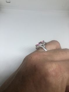 Vintage white and pink CZ ring 925 Sterling Silver Setting Size 7 Can be resized, my jeweler charges $10-$20 All rings are shipped free in the US in a nice gift box. Check out our over a THOUSAND great reviews Engraving is $4 per letter and is not always perfect depending on the piece. It can take a few days if the jeweler is busy. This is payable to Paypal Judithsltd@gmail.com Formal Pink Sterling Silver Diamond Ring, Pink Sterling Silver Crystal Ring With Center Stone, Pink Sterling Silver Diamond Ring With Accent Stones, Pink Sterling Silver Diamond Ring With Vs Clarity, Elegant Pink Sterling Silver Diamond Ring, Pink Diamond Ring With Vs Clarity In Sterling Silver, Pink Sterling Silver Crystal Ring For Formal Occasions, Pink Diamond Ring In Sterling Silver With Vs Clarity, Pear-shaped Cubic Zirconia Diamond Ring As A Gift