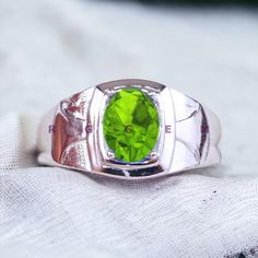 NATURAL PERIDOT GEM RING WEDDING BAND GIFT AND MEMENTOS Item Description:- MATERIAL-Silver METAL PURITY- 925 Sterling Silver GEMSTONE- Peridot Gemstone GEMSTONE COLOR- Green GEMSTONE SHAPE- Oval GENDER- Female, Male BIRTHSTONE- August JEWELRY TYPE- Ring HEALING PROPERTIES OF GEMSTONE- Healing with Peridot It Alleviates jealousy, resentment, spite, bitterness, irritation, hatred, and greed. Reduces stress, anger, and guilt. Peridot opens our hearts to joy and new relationships. It enhances confid Peridot Mens Ring, Oval Green Signet Ring For Wedding, Green Oval Signet Ring For Wedding, Lime Green Gemstone Birthstone Ring For Gift, Lime Green Gemstone Birthstone Ring As Gift, Lime Green Birthstone Ring As A Gift, Lime Green Birthstone Ring As Gift, Green Gemstone Signet Ring As Gift, Peridot Rings In Lime Green As Gift