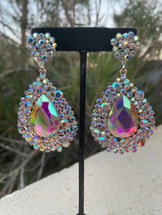 Iridescent Jeweled Jewelry For Parties, Rose Gold Earrings With Rhinestones, Party Rose Gold Rhinestone Earrings, Sparkling Rose Gold Crystal Earrings, Glamorous Rose Gold Crystal Earrings, Glamorous Earrings For Prom, Dazzling Sparkling Party Earrings, Rose Gold Crystal Earrings With Sparkling Stones For Party, Rose Gold Rhinestone Earrings