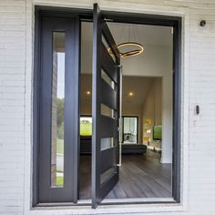 an open door leading into a living room