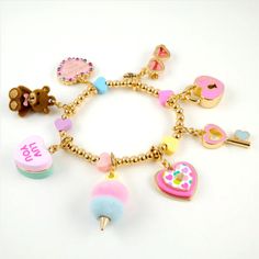 Description Delightful charm bracelet featuring vibrant and whimsical designs, perfect for adding a playful touch to any outfit. Includes a variety of colorful charms such as hearts, keys, and cotton candy, making it a fun accessory for kids. Ideal for gift-giving, birthday parties, and everyday wear, making it a versatile and cherished addition to any jewelry collection. Material & Care Material: High-Quality Enamel and Metal Alloy Care: Wipe clean with a soft cloth, avoid contact with water an Charm It, Necklace Charms, Candy Making, Pink Purse, Cute Charms, Cotton Candy, Charm Necklace, Birthday Parties, Jewelry Collection