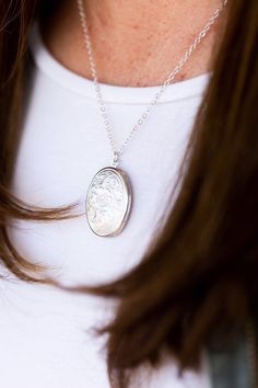 >>> Keep their memory close when you wear this beautiful remembrance locket.>>> Whether for yourself or someone else, every order is creatively packaged and ready to gift.>>> An antiqued silver photo locket with floral detail hangs from a silver plated chain; lobster clasp closure.>>> Locket pendant measures 27mm x 33mm {larger than a quarter} and is lead and nickel safe.>>> Back of locket is smooth but distressed giving it a vintage appearance.>&g Cheap Adjustable Silver Locket Necklace, Personalized Amulet Necklaces For Anniversary, Personalized Amulet Necklace For Anniversary, Memorial Amulet Locket Necklace, Etched Pendant Locket Necklace As A Gift, Birth Flower Pendant Jewelry For Memorial, Silver Birth Flower Jewelry Keepsake, Spiritual Silver Locket Necklace For Memorial, Round Pendant Locket Necklace With Birth Flower For Anniversary