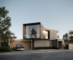 a car parked in front of a modern house