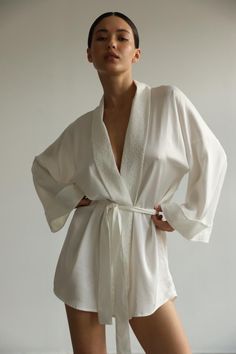 Classic kimono crafted from high quality Italian viscose with lace details. Relaxed silhouette and wide sleeves provide true comfort. Wrap yourself in true luxury.  Our model wears size XS, her measurements are 84/64/89 cm and she is 168 cm tall. Length 88 cm/34,5 inches White Bridal Robe, Wedding Nightgown, Slippers Outfit, Ss 2024, Bridal Kimono, Gown Bridesmaid, Silk Dressing Gown, Sheer Robe, Silk Kimono Robe