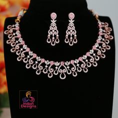 Statement American Diamond rose gold Necklace set, featuring Pink stone Luxury look CZ Diamond and white AD stones in floral design. Perfect for weddings, parties, or any special occasion and feel like a Bollywood bride. Bollywood Bridal, Indian Choker Necklace, Pink Choker, Diamond Choker Necklace, Diamond Choker, Rose Gold Pink, Gold Necklace Set, Indian Wedding Jewelry, American Diamond