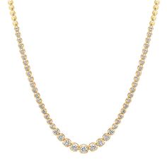 An updated take on a timeless piece, our Diamond Graduated Tennis Necklace is handcrafted in 18-karat yellow gold and set with 2.7 carats of round, brilliant cut diamonds in varying size - with the largest diamonds set in the center and gradually get smaller until they meet the plain, polished gold bezels that comprise the rest of the necklace. Carat Weight: 2.7 ct Necklace measures 16 inches in length Diamond color is G-H Diamond clarity is SI1-SI2 Push Clasp Fastening with Safety Made with lov Yellow Gold Tennis Necklace With Prong Setting, Gold Tennis Necklace With Prong Setting, Yellow Gold Fine Jewelry Tennis Necklace, Luxury Diamond-cut Tennis Necklace For Gift, Fine Jewelry Diamond-cut Tennis Necklace For Formal Occasions, Diamond Tennis Necklace, Tennis Necklace, Diamonds And Gold, Diamond Clarity