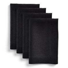 four black napkins on a white background