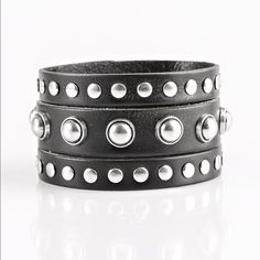 Win Your Spurs - Black Round And Flat Silver Studs Are Studded Across The Front Of A Thick Black Leather Band That Has Been Spliced Into Three Bands. Features An Adjustable Snap Closure. Sold As One Individual Bracelet. Punk Black Bracelet With Silver Studs, Black Leather Punk Bracelet With Silver Studs, Silver Punk Bracelets With Studs, Punk Style Silver Bracelet With Studs, Party Leather Bracelet With Rivets, Black Trendy Bracelets With Studs, Trendy Black Bracelets With Studs, Silver Leather Punk Bracelet With Black Band, Punk Style Silver Leather Bracelet With Black Band