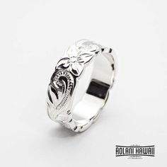 Set of Traditional Hawaiian Hand Engraved Sterling Silver Ring (6mm & 8mm width, Flat Style)Custom order and Hand made in the Aloha StateHand engraved with Old English design - Hawaiian Maile, Plumeria, and Ocean wave.Ring is perfect for people with an active life style, also great gift for anniversary, wedding or any special occasion.FREE inside message engraving, please put in your request when ordering.FREE SHIPPING in the USU.S order will be shipped FREE with USPS First Class Mail with track Carved White Gold Ring, White Engraved Jewelry For Promise, White Engraved Promise Jewelry, Carved White Gold Jewelry For Anniversary, Carved White Gold Anniversary Ring, Traditional White Gold Rings With Polished Finish, Classic White Gold Engraved Carved Ring, Classic Carved White Gold Engraved Ring, Etched Round Band Promise Jewelry