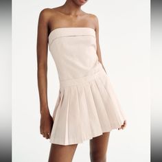 Such A Cutie Dress! So Many Things To Do With It White Tights! Or Edgy Black Chunky Boots Or Cute And Dainty White Heels. Says Pale Pink Color But I Think It’s A Light Beige And White! Ships Same Day Beige Stretch Mini Dress For Summer, Chic Stretch Mini Dress With Straight Neckline, Summer Pleated Strapless Mini Dress, Chic Strapless Stretch Mini Dress, Stretch Mini Strapless Dress For Day Out, Stretch Strapless Mini Dress For Day Out, Spring Strapless Dress With Straight Neckline And Stretch, Chic Straight Neckline Mini Dress With Stretch, Fitted Strapless Dress For Day Out