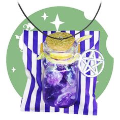 a glass jar filled with purple liquid on top of a green and white striped cloth