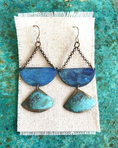 Oxidized brass in beautiful sky blue and verdigris patina finish earrings hang from oxidized sterling silver ear wires.  Measurements:2.5”x1.25” Blue Artisan Copper Earrings, Copper Dangle Jewelry With Patina, Copper Dangle Earrings With Patina, Artisan Blue Copper Earrings, Unique Blue Copper Earrings, Soldered Turquoise Brass Earrings, Turquoise Soldered Brass Earrings, Blue Brass Dangle Earrings, Artisan Brass Jewelry With Patina