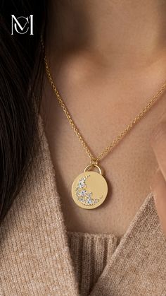 The Skyward Necklace was carefully handcrafted from solid 14k gold and depicts a crescent sweep made of ten round diamonds and three oval diamonds. ﻿The gold pendant is 19.5mm in diameter, 2mm thick and is available on its own or with a 20" rope chain that matches your choice of gold color: yellow, white, or rose. Find more images at melaniecasey.com. Elegant Crescent Engraved Necklace, Elegant Engraved Crescent Necklace, Elegant Gold Jewelry With Moon Phase Detail, Elegant Moon Charm Jewelry For Anniversary, Celestial Half Moon Jewelry For Anniversary, Elegant Gold Moon Phase Jewelry, Celestial Sterling Silver Necklace With Single Cut Diamonds, Luxury Diamond Jewelry With Moon Charm, Celestial Style Necklace With Single Cut Diamonds For Anniversary