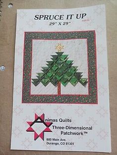 the pattern for this christmas tree quilt is in very good condition