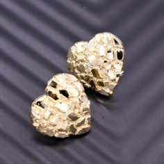 Here's a Nugget Earrings. From our Earrings Collection, this 10kt Solid Yellow Gold 3/4" Heart Shaped Nugget Earrings features Shiny & Diamond-Cut finish. Product Details: Metal: Real Solid 10kt Gold Weight: 3.15 grams Length: Just over 3/4" = 19mm Width: Just under 3/4" = 18mm Bail/Clasp: Push Back Golden Nugget Earrings, Gold Heart Nugget Earrings, Classic Luxury Nugget Jewelry, Heart Nugget Earrings, Mexican Gold Earrings, Gold Heart Earrings Diamond Cut Gift, 14k Gold Diamond Cut Heart Earrings, 14k Gold Diamond Cut Heart Earrings For Anniversary, Heart Cut Yellow Gold Earrings For Anniversary