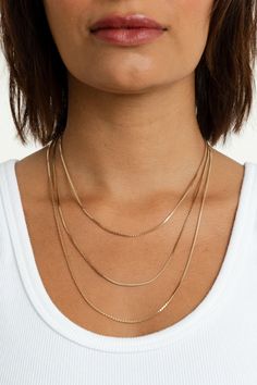 Add a charm or wear it on its own—the Bowie Chain is perfect for both layering and wearing solo. Its versatile design makes it an essential piece for any jewelry collection, effortlessly transitioning from a subtle accent to a standout statement. 18k gold-plated brass 2mm chain width Available in 3 lengths 15" - 16" 18" - 19" 21" - 22" **Does not pair with the Gianna, Harlyn, Radiant, Scarlett, or Pave Initial Charms Fine Jewelry With Adjustable Chain, Fine Jewelry Layering Pieces With Adjustable Chain, Fine Jewelry With Adjustable Chain For Layering, Rose Gold Box Chain Jewelry For Everyday, Everyday Rose Gold Box Chain Jewelry, Everyday Rose Gold Snake Chain Necklace, 14k Yellow Gold Jewelry With Delicate Chain, Everyday Double Chain Rose Gold Jewelry, Timeless Charm Necklace With Adjustable Chain For Everyday