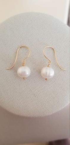 Handmade Statement Earrings with Large Freshwater Pearls, Gold Fill and Freshwater Pearl Earrings Large AAA grade cream-colored round-shaped Freshwater pearls with handcrafted ear wires.  Handcrafted with love and care. Each gemstone and pearl is a work of nature and no two are exactly alike, please allow for some variation in the tone and color. Minor inclusions or surface irregularities are also completely normal and should not be considered a defect. Should you find yourself to be unhappy wit Pearl White Round Earrings For Everyday, Everyday Round Hypoallergenic Pearl Earrings, Everyday Hypoallergenic Round Pearl Earrings, Everyday White Round Pearl Earrings, Everyday White Pearl Drop Earrings, Classic Adjustable Drop Pearl Earrings, Handmade Pearl White Round Pearl Earrings, White Round Bead Earrings For Everyday, Everyday Round Pearl Earrings With Ear Wire