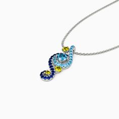 This necklace is brought to you in a stunning display of style and craftsmanship. A combination of light blue, midnight blue, and yellow gold stones, the necklace is a premium miniature version of Van Gogh's timeless Starry Night painting. This piece of work reminds us to trust our dreams and not believe the critics of the world. "There is always hope, even in the darkest of times." So trust your dream and let this alluring jewelry make a statement.Carat Weight: 0.382 ctStone Size: 1.4,2.2,3,0.9 Blue Round Fusion Necklaces, Blue Fusion Style Round Pendant Jewelry, Blue Sterling Silver Fusion Necklace, Blue Fusion Pendant Jewelry, Blue Sterling Silver Multi-stone Necklace, Sterling Silver Multi-stone Blue Necklaces, Blue Multi-stone Sterling Silver Necklace, Blue Multi-stone Necklaces For Formal Occasions, Formal Blue Multi-stone Necklaces