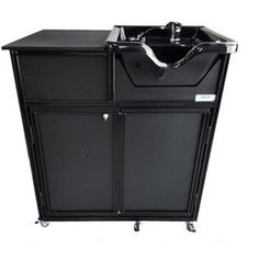 a black cabinet with a sink and faucet on it's side, in front of a white background