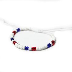 These single strand beaded bracelets are a great complement to any of the bracelets in the America Collection. Casual White Hand-strung Wristband, Adjustable White Friendship Bracelets, Adjustable White Nylon Cord Friendship Bracelets, Casual White Jewelry With Nylon Cord, Casual Beaded Bracelets With Nylon Cord For Beach, White Nylon Cord Friendship Bracelet, White Nylon Cord Bracelets For Beach, White Braided Bracelets With Sliding Knot Nylon Cord, White Braided Bracelets With Colorful Beads For Friendship