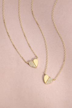 Better together. Share the love and gift one-half of this sweet set of two diamond and solid gold heart necklaces to a friend or family member. Wear this everyday keepsake as a reminder of the ones who matter most. diamond necklace; trend; spring styling; summer aesthetic; vacation; travel; new adventures; shopping; fashion; chic; streetwear; styling; styling jewelry; gift ideas; mothers day gifts; gifts for her; gifts for mom; mother's day; initial jewelry; matching jewelry; matching necklace White Gold Tarnish-resistant Jewelry For Mother's Day, Everyday Luxury Sterling Silver Tarnish-resistant Necklace, Modern Heart Pendant Jewelry For Anniversary, Modern Heart-shaped Jewelry For Anniversary, Everyday Stackable Diamond Jewelry, Minimalist Single Cut Diamond Jewelry For Anniversary, Luxury 14k Gold Heart-shaped Jewelry, Modern Diamond Jewelry For Everyday Wear, Luxury Heart-shaped Tarnish Resistant Jewelry