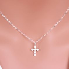 "Sterling Silver Cross Necklace - Religious Jewelry - Tiny Sterling silver CZ Cross Necklace - Layering Necklace Dainty Cross Necklace - Gift for Her ★★The necklace makes of .... -Sterling Silver 9.4x17.5mm Small CZ Cross Pendant, 3.2mm Closed Ring Sterling silver cable chain with spring claw . -Total length will be 16\" 17\" 18\" or 19\" depend on customer request. -Come up with beautiful ribbon gift box -One set of care instruction package that enhance your present ... All quantities are avail Sterling Silver Cross Pendant Charm Necklace, Sterling Silver Clavicle Chain Cross Necklace, Spiritual Silver Charm Necklace With Clavicle Chain, Silver Cross Pendant Charm Necklaces, Nickel-free Cross Pendant Necklace As Gift, Casual Silver Hypoallergenic Cross Pendant Jewelry, Spiritual Silver Charm Necklace As Gift, Hypoallergenic Silver Cross Pendant Jewelry, Silver Spiritual Cross Necklace With Clavicle Chain